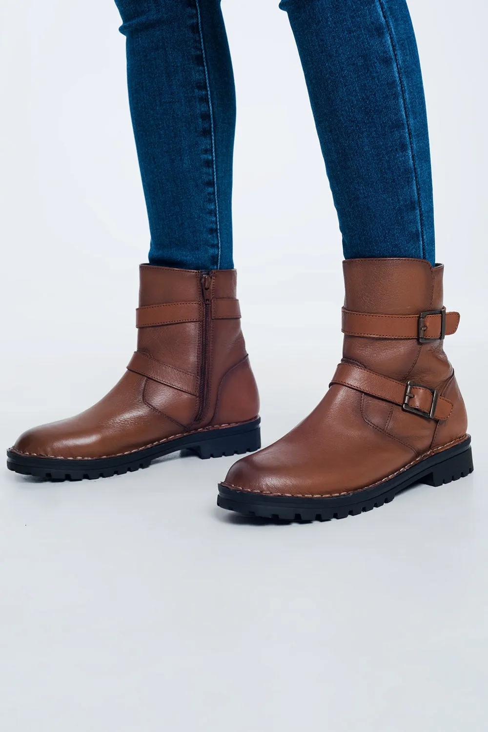Brown buckled boots